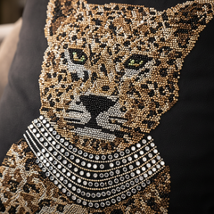 Leopard design with rhinestone embellishments on a black background
