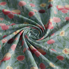 Rolled-up fabric with a floral pattern on a light blue background