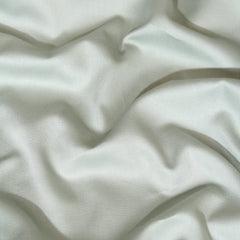 Close-up of white fabric with folds