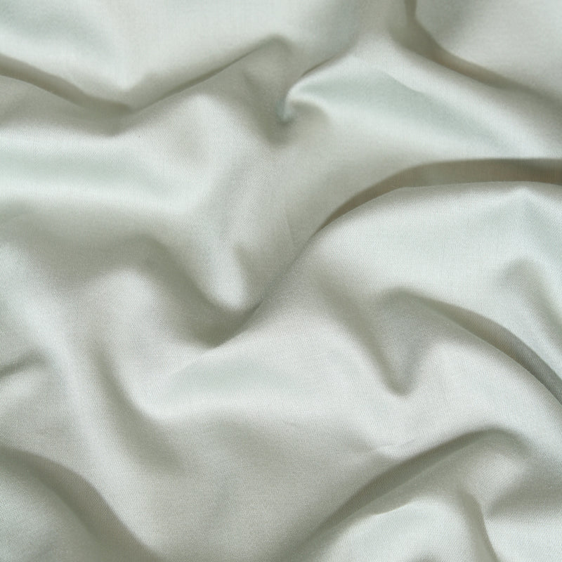 Close-up of white fabric with folds
