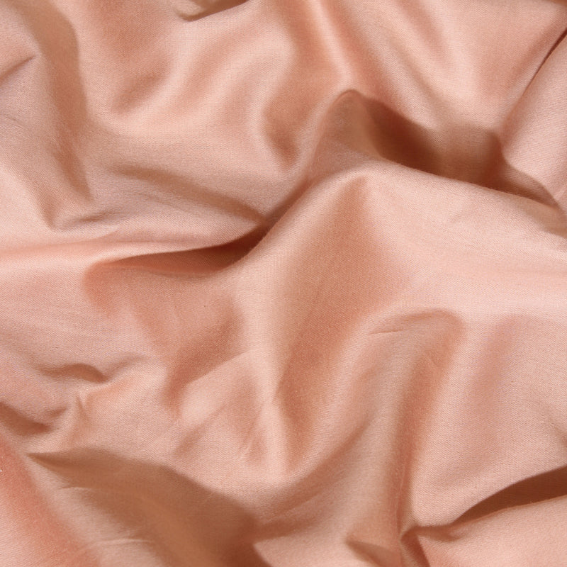 Close-up of pink fabric with ripples