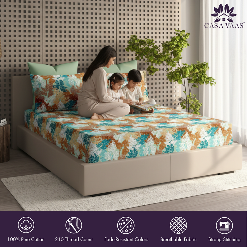 Family reading on a bed with a floral pattern, Casa Vaas brand visible