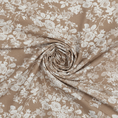 Roll of fabric with beige and white floral pattern