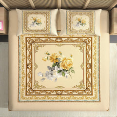 Decorative bedspread with floral design and intricate border on a bed.