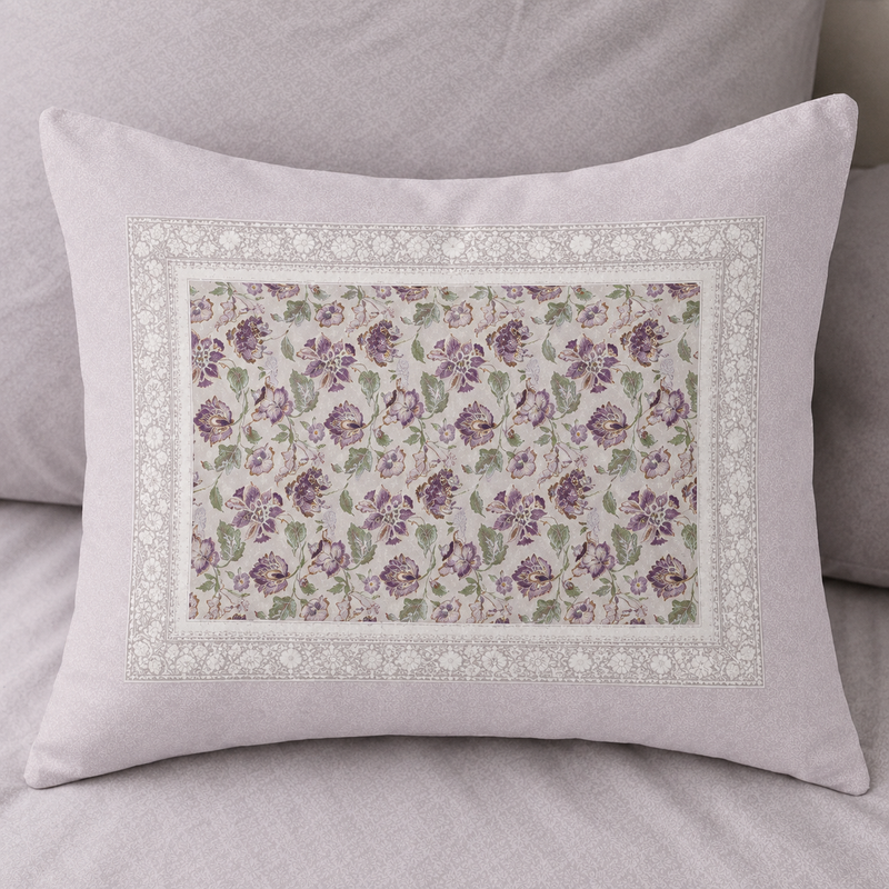 Decorative pillow with floral pattern on a gray background