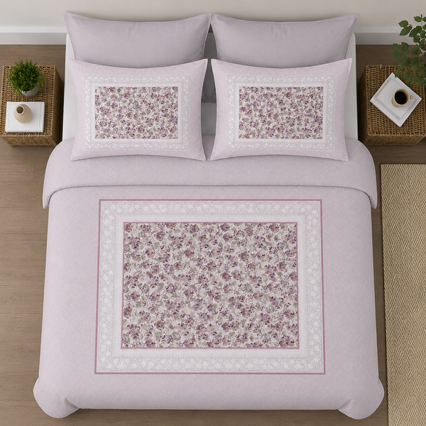 Floral patterned bedding set on a bed with decorative pillows.