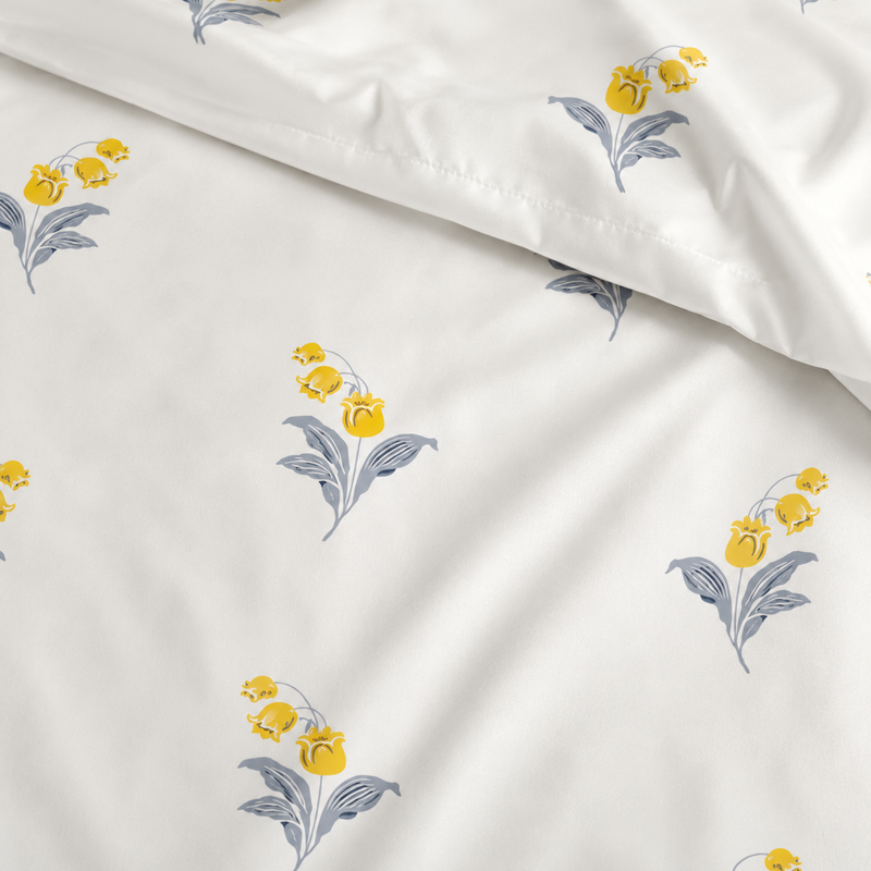 White fabric with yellow floral patterns