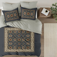 Decorative bedspread with floral patterns on a bed in a bedroom setting.