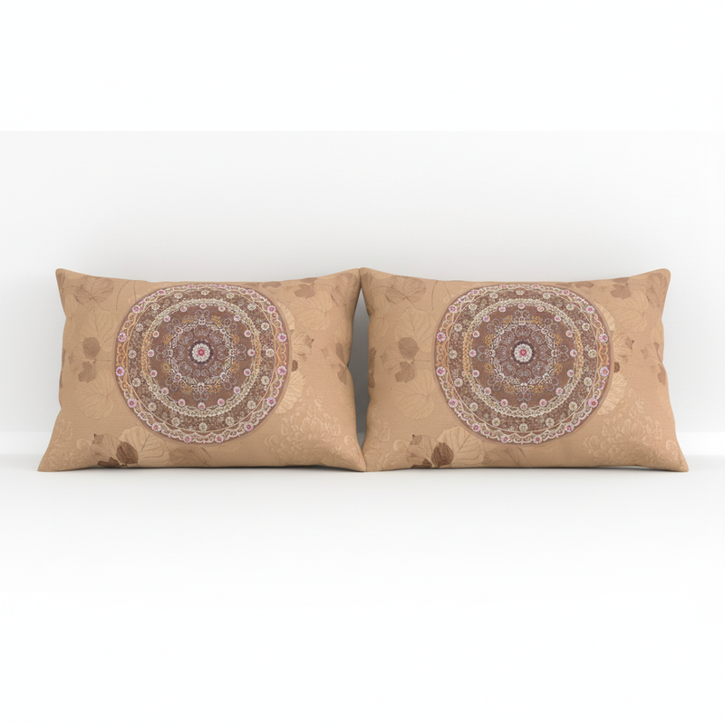 Two brown pillows with mandala patterns on a white background
