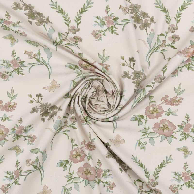 Floral fabric with pink flowers and green leaves on a beige background