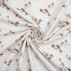 Rolled-up fabric with a floral pattern on a white background
