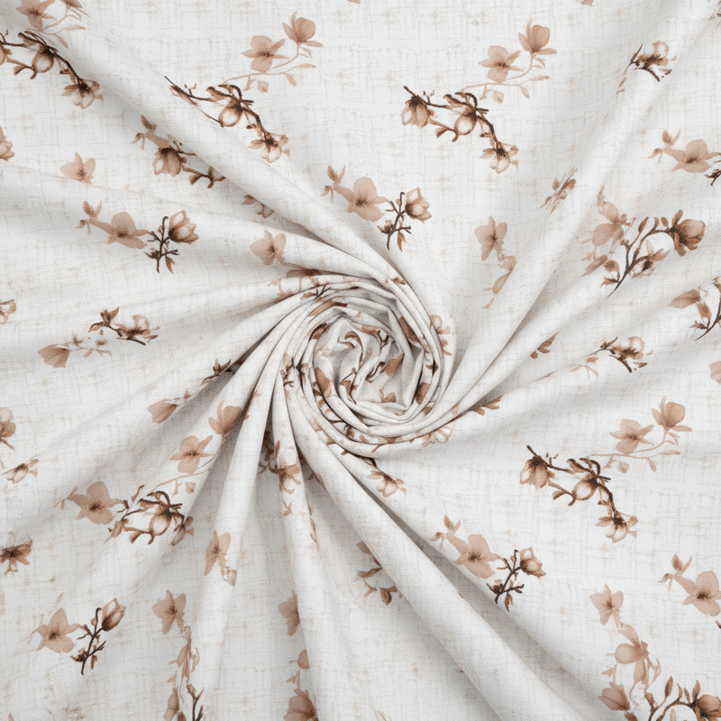 Rolled-up fabric with a floral pattern on a white background