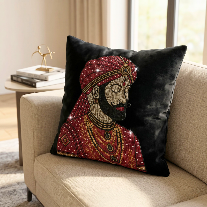 Decorative pillow with a colorful face design on a beige couch.