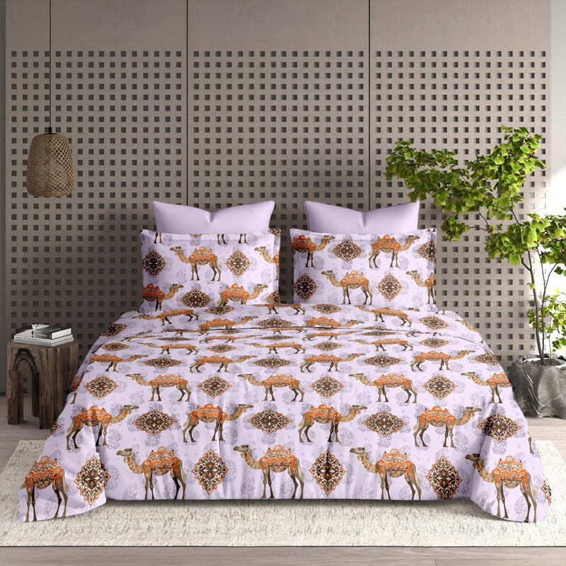 Bedding set with camel pattern on a bed in a room with a decorative wall and plant.