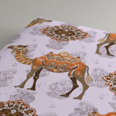 Fabric with camel and mandala pattern on a white background