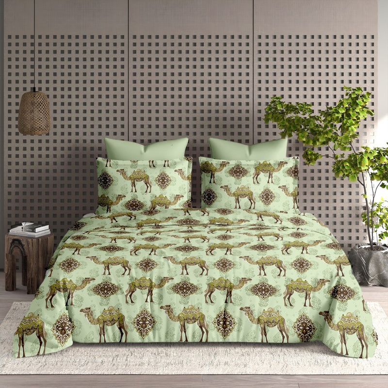 Bedding set with camel pattern on a bed in a room with a decorative headboard and plant.